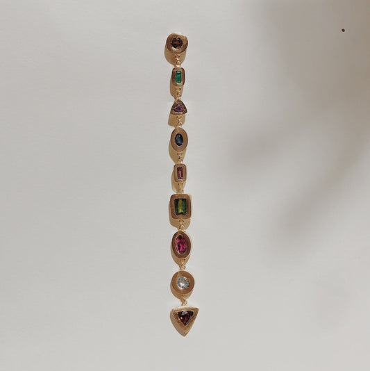 BRINCO LUZ TURMALINA